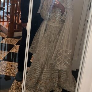Elegant White Embroidered three piece Lengha